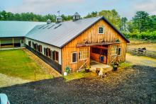 Black & Tan Barn With Wooden Front