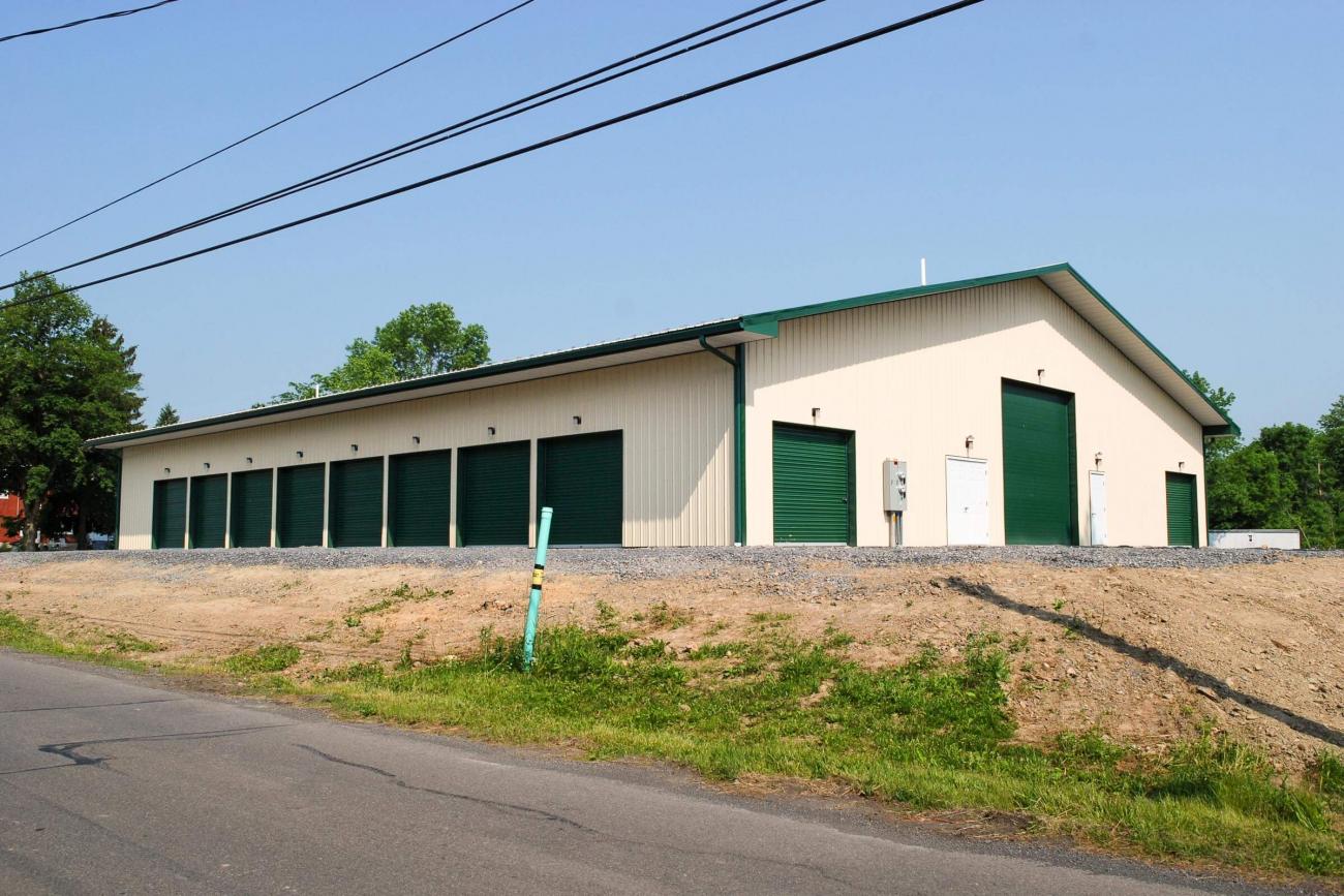 Tan &amp; Green Metal Commercial Building