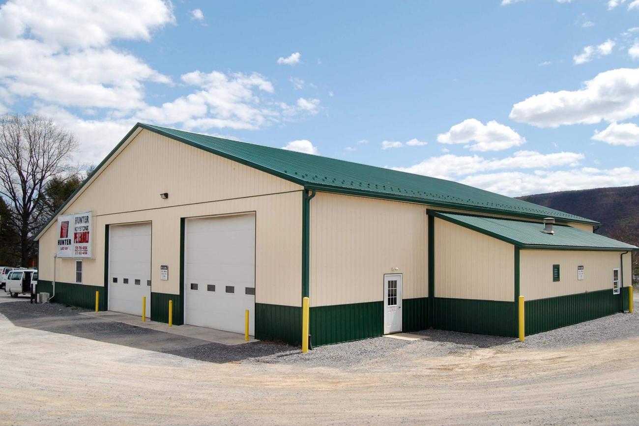 Tan &amp; Green Metal Commercial Building