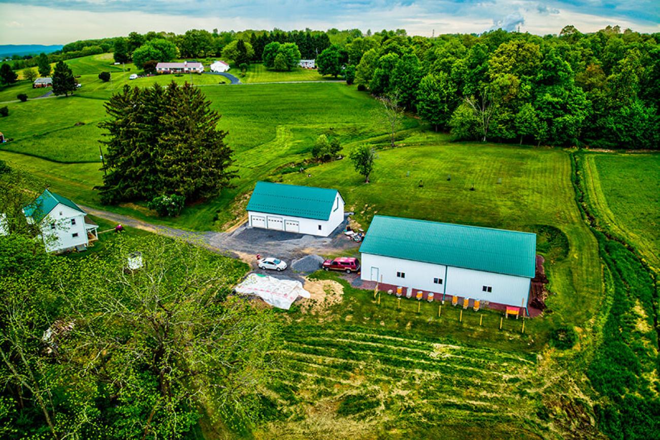 Green Metal Roof Barn Aerial View