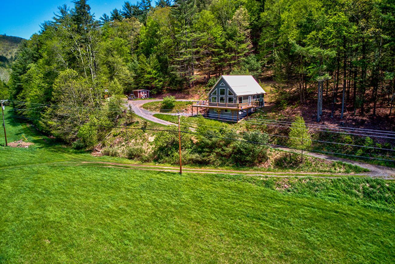 Siding Cabin With Metal Roof Aerial View