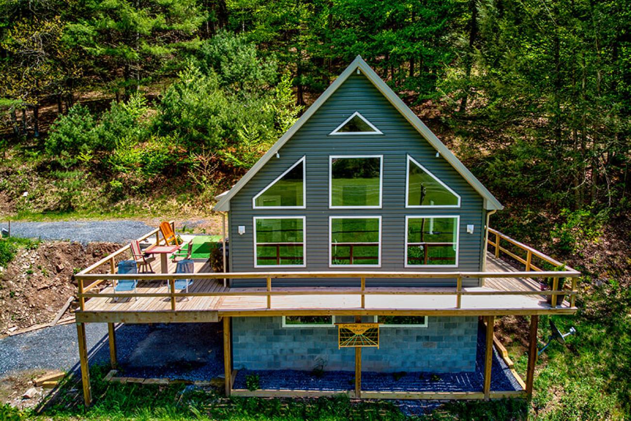 Siding Cabin With Metal Roof Front View