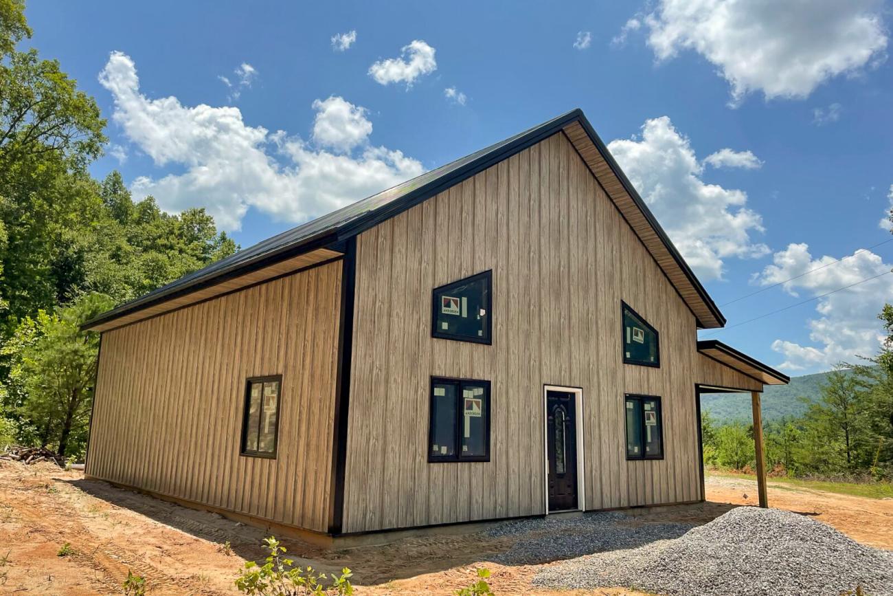 Cabin with Board &amp; Batten metal siding