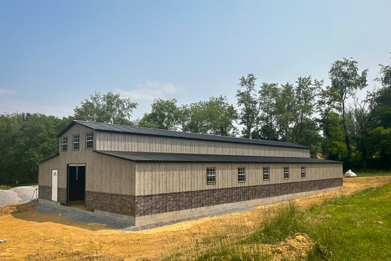 horse barn with Board &amp; Batten metal siding
