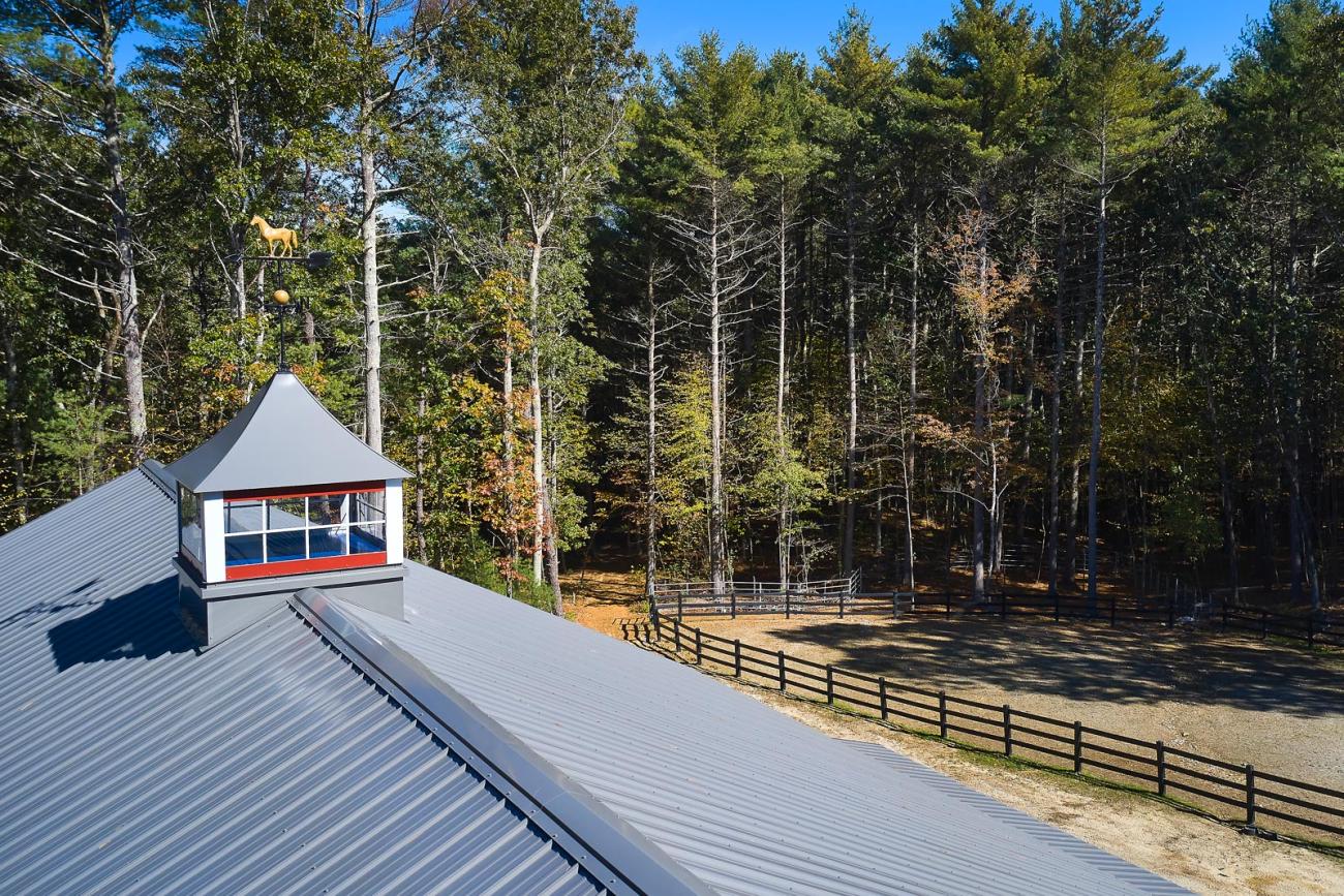 Metal cupola on horse barn