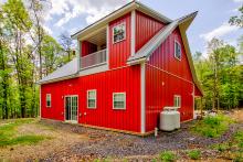 Bright Red Metal Cabin Back View