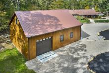 Woodgrain board &amp;amp; batten siding on garage